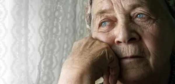 old women looking throughtful